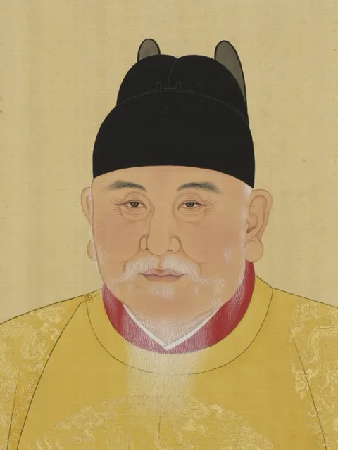 Court portrait bust of the Hongwu Emperor in a yellow dragon robe, inscribed 大明太祖高皇帝.