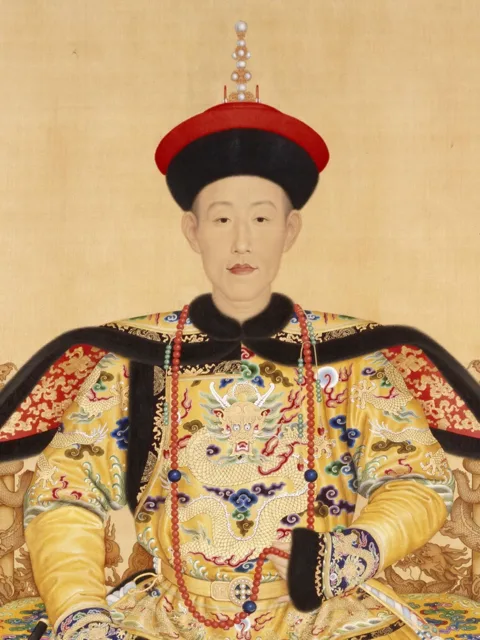 Court portrait of the Qianlong Emperor enthroned in yellow dragon robes and a summer hat.